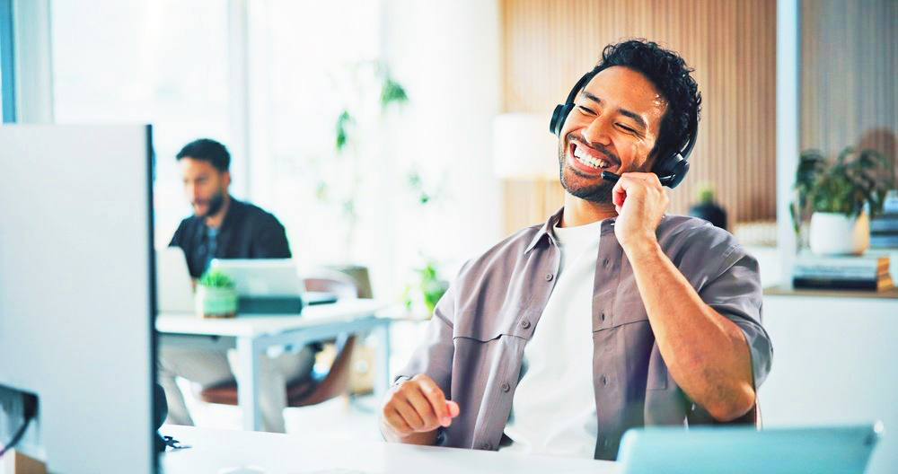 Smiling man on headset