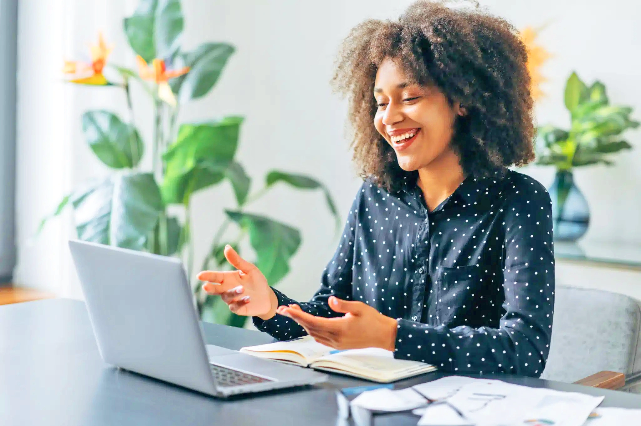 Woman smiling at desk